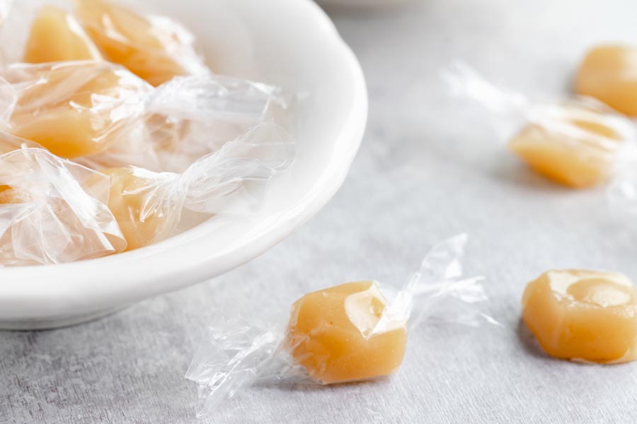 keto candy caramel chews in a bowl and on a table