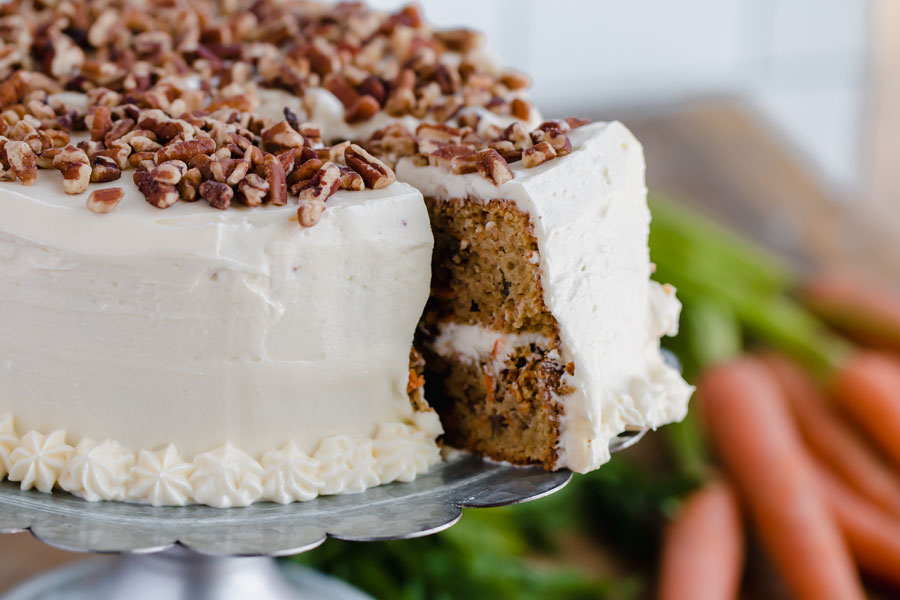 cutting out a piece of low carb keto carrot cake