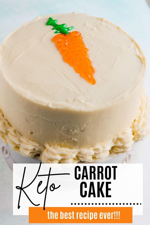a small frosted carrot cake with a carrot drawn on top