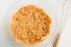 mixed carrot cake batter in a bowl