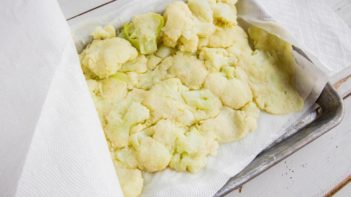 using paper towels to squeeze moisture out of cauliflower