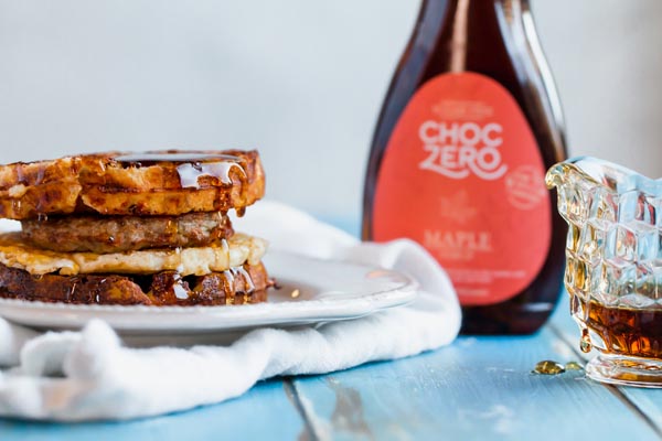 keto waffles topped with chocolate syrup