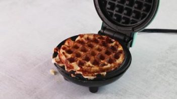 cooked maple chaffle on a waffle iron