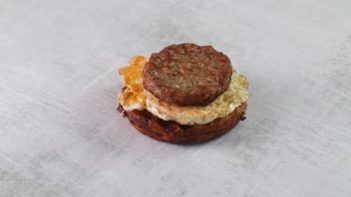assemble chaffle breakfast sandwich with maple waffle