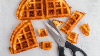chaffle cut up into chunks with scissors
