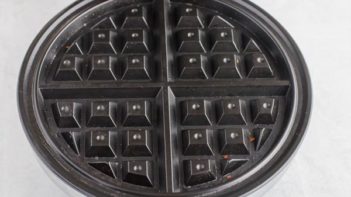 A waffle maker preheating