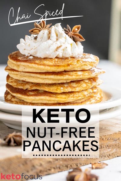a pinterest image of a stack of pancakes topped with whipped cream, anise and syrup. the text states "chai spiced" and "keto nut-free pancakes"