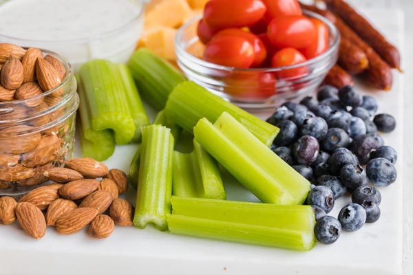 blueberries, celery and nuts on a plate