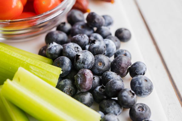 blueberries next to celery sticks