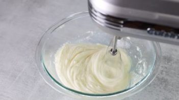 creaming cheesecake mixture with an electric mixer