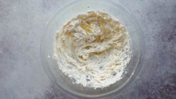 white cream cheese mixed in a bowl