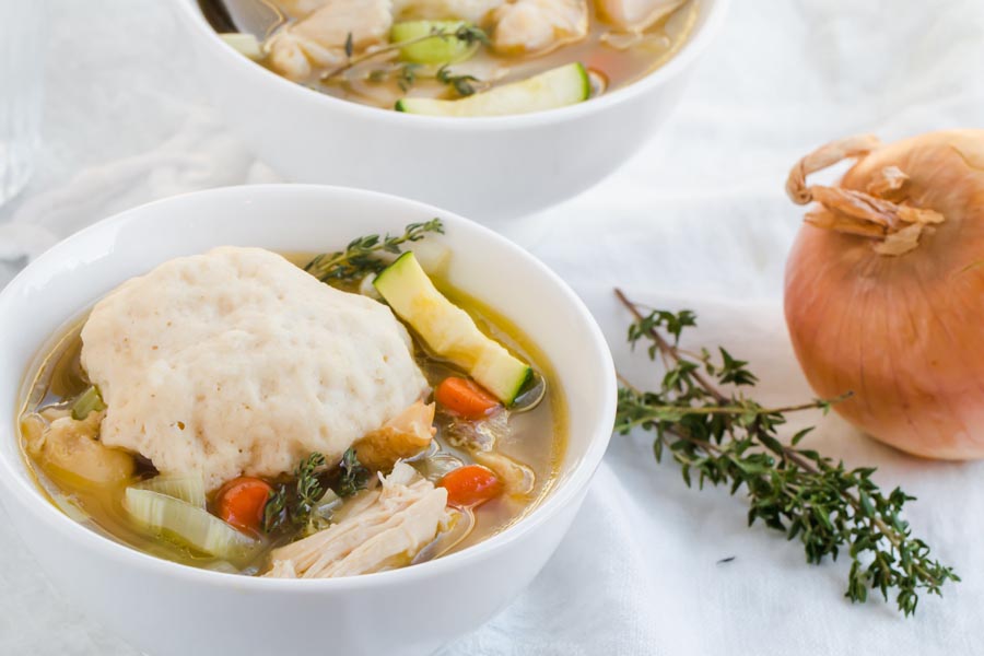 two bowls of chicken and dumplings