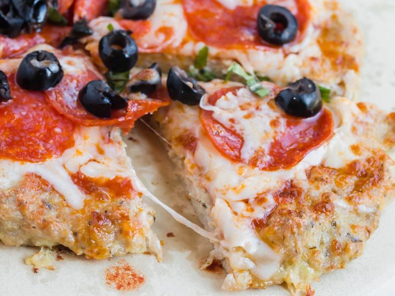 slice of keto chicken crust pizza