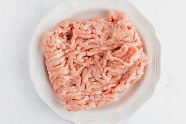 bowl of ground chicken meat