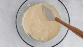 bowl of melted mozzarella cheese