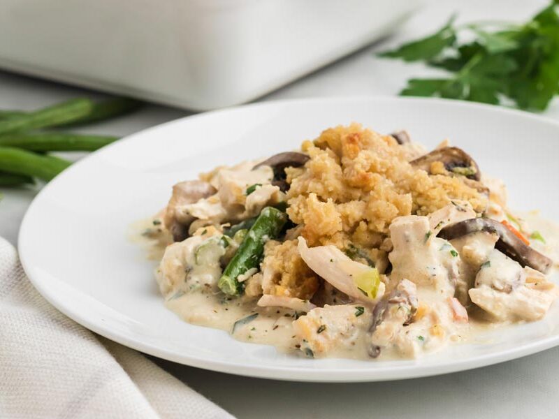 Chicken pot pie casserole on a white plate.