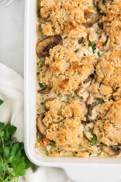 Golden drop biscuits baked on top a casserole of chicken, mushrooms, green beans and carrots.