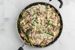 A creamy chicken and vegetable mixture in a skillet.