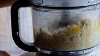 mixing pie dough in a food processor