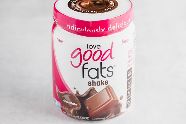 a can of love good fats chocolate shake mix