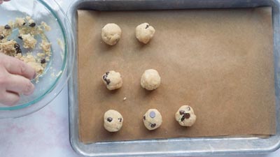 rolled balls of cookie dough on a tray