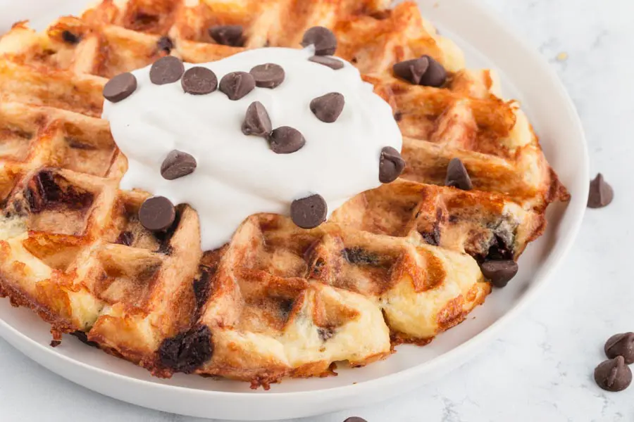 large low carb waffle with whipped cream and chocolate chips