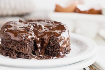 melty hot chocolate inside a cake with a bite taken out