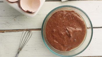 chocolate batter in a glass bowl