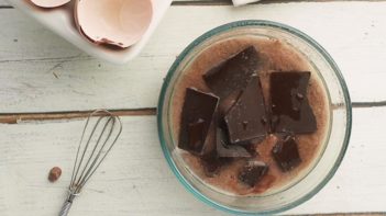 chocolate chunks floating on top of cake batter