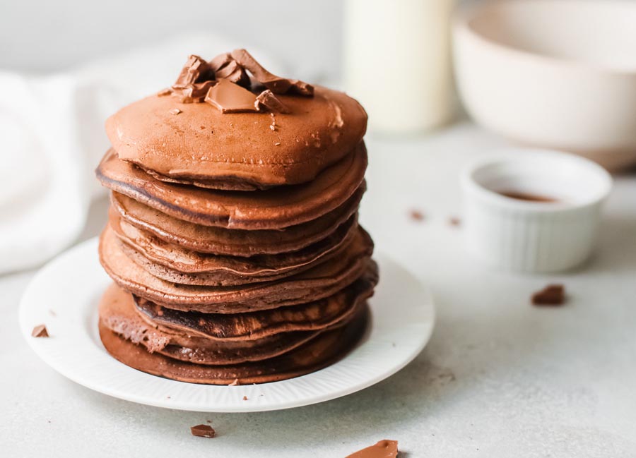 keto chocolate pancakes on a plate on a gray background