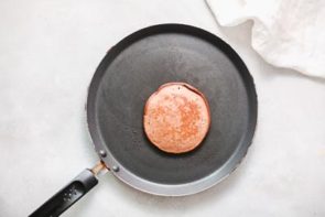 a chocolate pancake cooking on a skillet