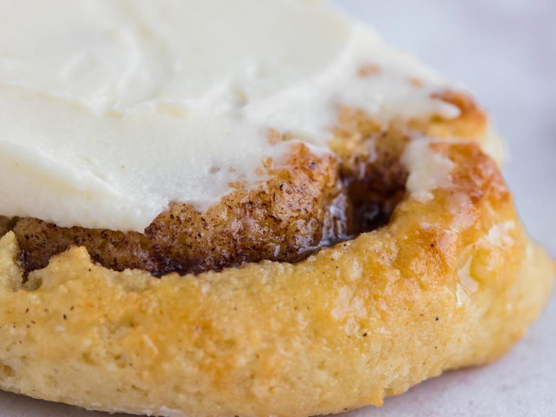 gooey warm cinnamon rolls topped with cream cheese frosting