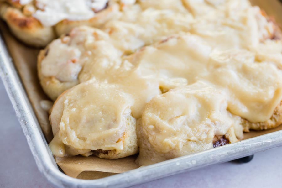 tray of frosted cinnamon rolls