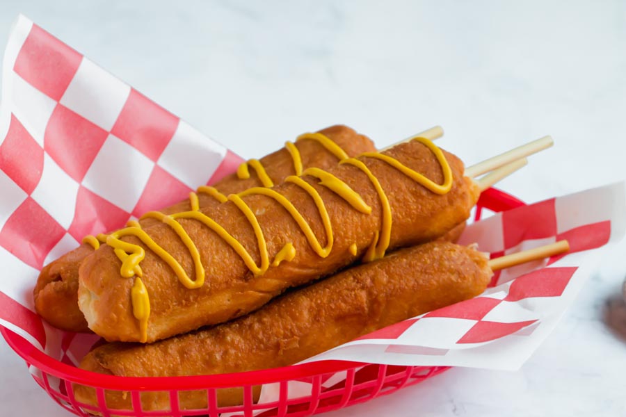 keto corn dogs hand dipped