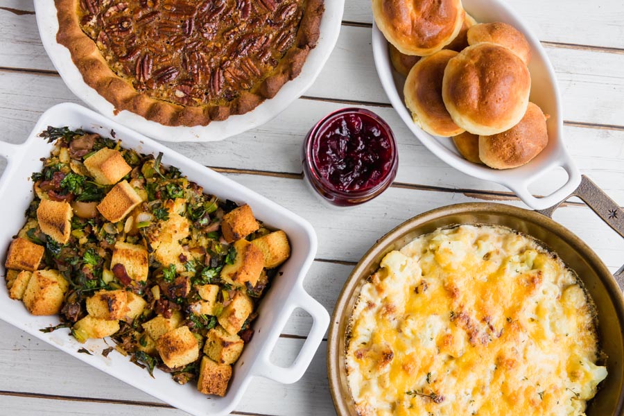 overhead view of stuffing, keto rolls, pecan pie