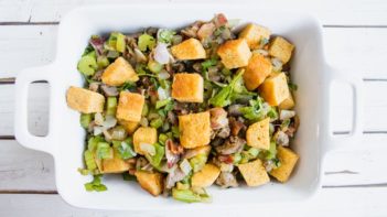 overhead view of uncooked thanksgiving dressing in a dish