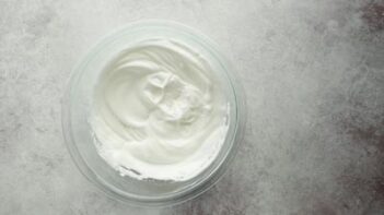 egg whites whipped into a meringue texture in a bowl