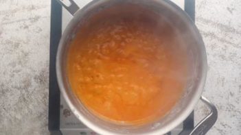 red sauce boiling in a sauce pan