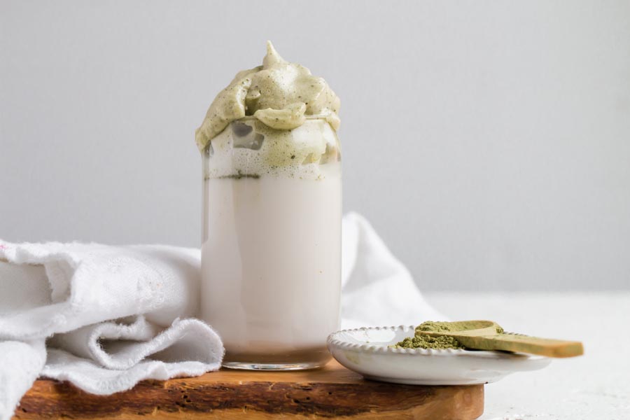 layers of cream and matcha foam in a keto coffeehouse drink