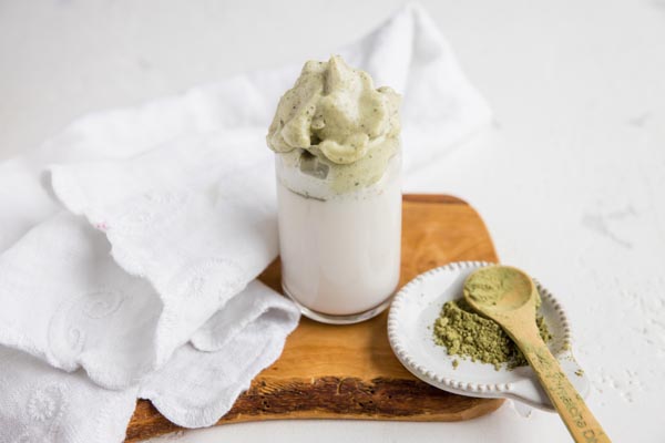 creamy and smooth dalgona style matcha keto latte with powdered green tea