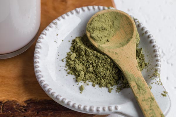 powdered green matcha tea in a bowl