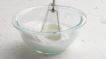 whipped egg whites in a bowl