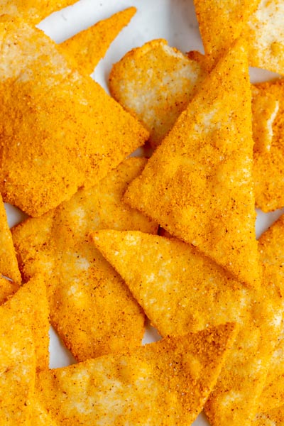 a pile of cheese dusted dorito chips