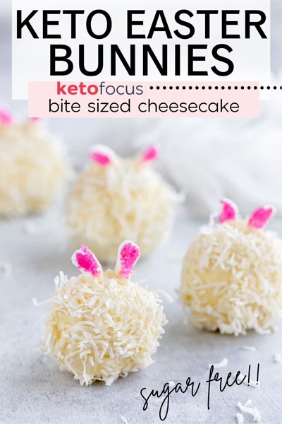 three bunny bites covered in shredded coconut and two pink marshmallow bunny ears