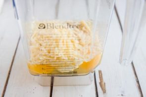 egg and cheese sitting at the base of a blendtec blender