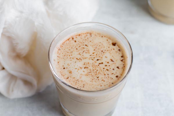 glass of cold keto eggnog