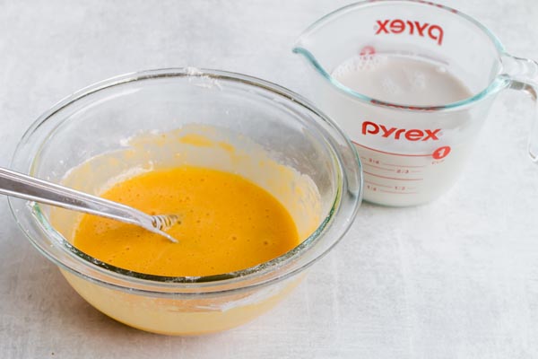 bowl of mixed egg yolks with cream