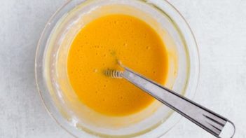 mixture of sweetener and egg yolks in a small bowl