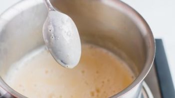 eggnog coating the back of a spoon