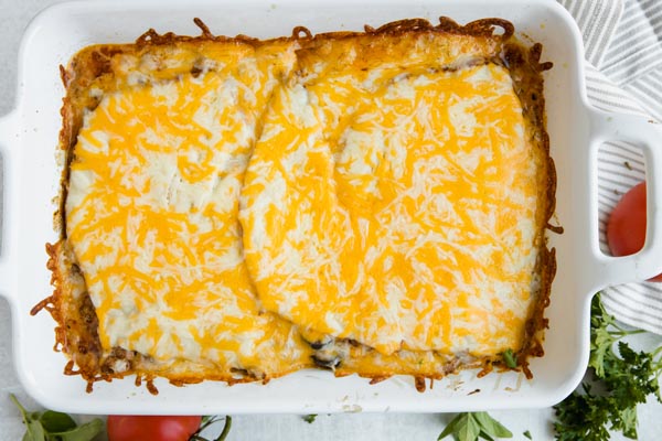 cheesey enchilada casserole in a dish